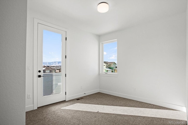 view of carpeted spare room