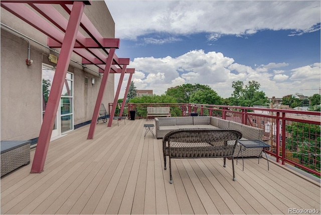 1488 Madison St Unit 211, Denver, CO 80206 - wooden deck featuring a pergola and an outdoor hangout area