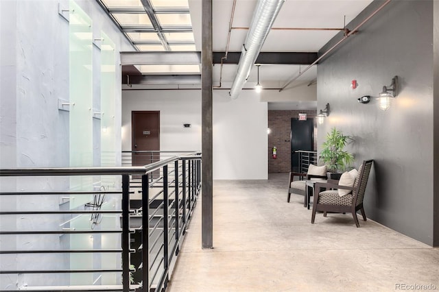 210 W Magnolia St Unit 360, Fort Collins, CO 80521 - corridor with concrete flooring