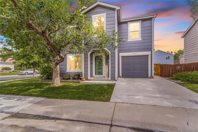 5320 E 100th Dr, Thornton, CO 80229 - traditional-style home featuring an attached garage and concrete driveway