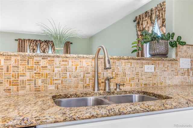 5320 E 100th Dr, Thornton, CO 80229 - kitchen view of backsplash and light stone counters