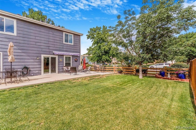 5320 E 100th Dr, Thornton, CO 80229 - fenced backyard featuring a patio