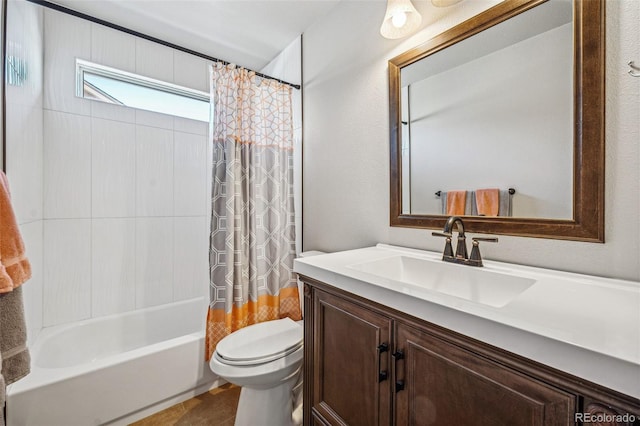 bathroom with toilet, shower / bath combo with shower curtain, and vanity