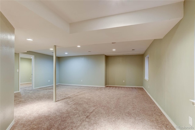 basement with light colored carpet