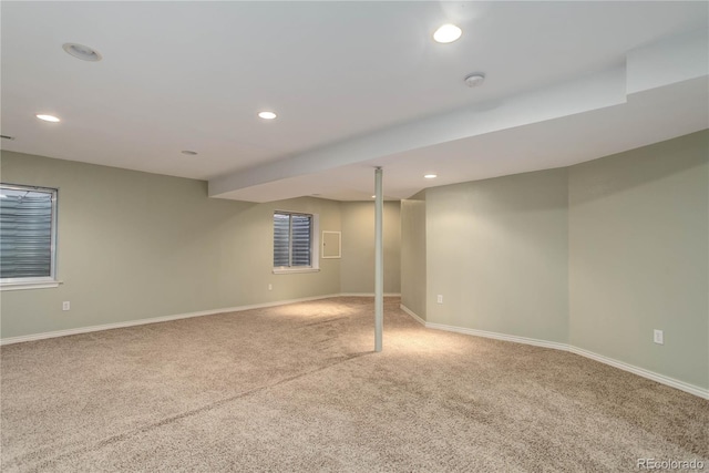 basement with light colored carpet