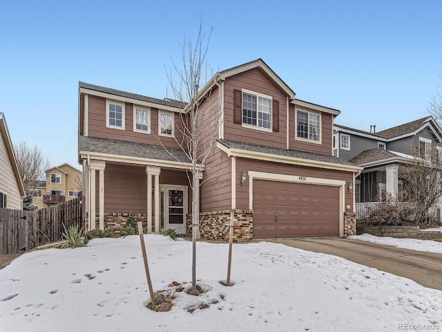 view of front of home with a garage