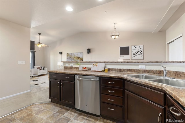 2405 Calais Dr Unit 18A, Longmont, CO 80504 - kitchen with stainless steel dishwasher, a sink, vaulted ceiling, dark brown cabinets, and baseboards