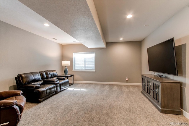 living room featuring recessed lighting, light colored carpet, and baseboards