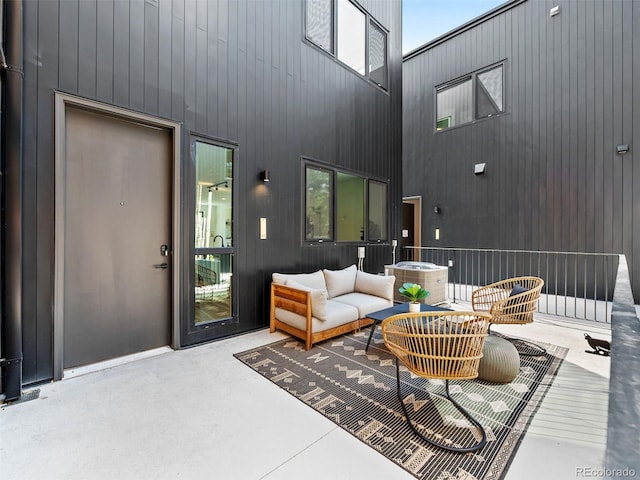 1601 Park Ave Unit 212, Denver, CO 80218 - view of patio / terrace with central AC unit and outdoor lounge area
