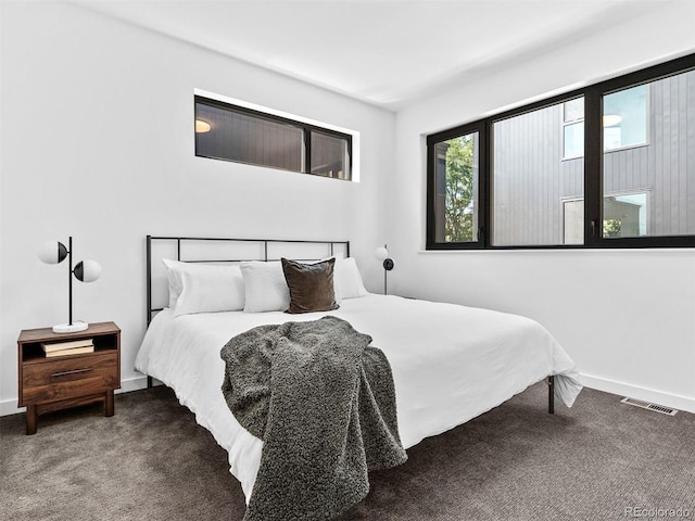 1601 Park Ave Unit 212, Denver, CO 80218 - bedroom with carpet, visible vents, and baseboards