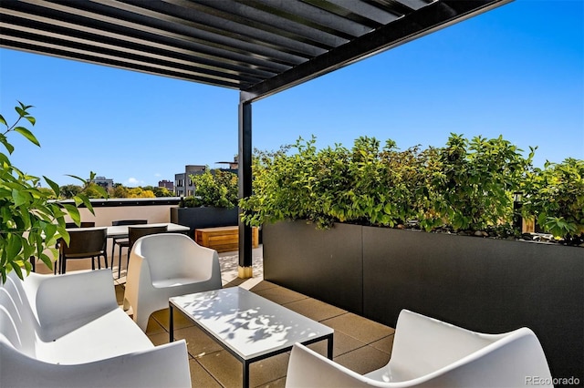 1601 Park Ave Unit 212, Denver, CO 80218 - view of patio / terrace featuring a balcony and an outdoor hangout area