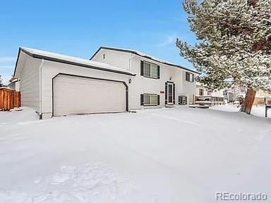9135 W Maplewood Ave, Littleton, CO 80123 - view of front of property featuring a garage