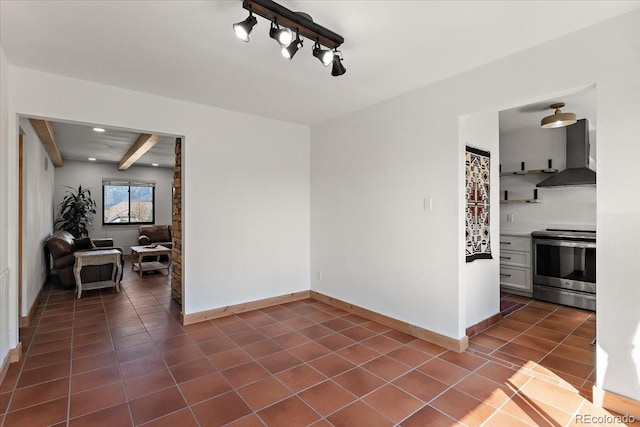 2979 Mesa Rd Unit D, Colorado Springs, CO 80904 - unfurnished dining area with dark tile patterned floors, baseboards, and recessed lighting