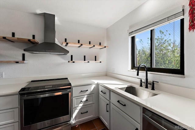 2979 Mesa Rd Unit D, Colorado Springs, CO 80904 - kitchen featuring stainless steel appliances, open shelves, a sink, wall chimney range hood, and light countertops