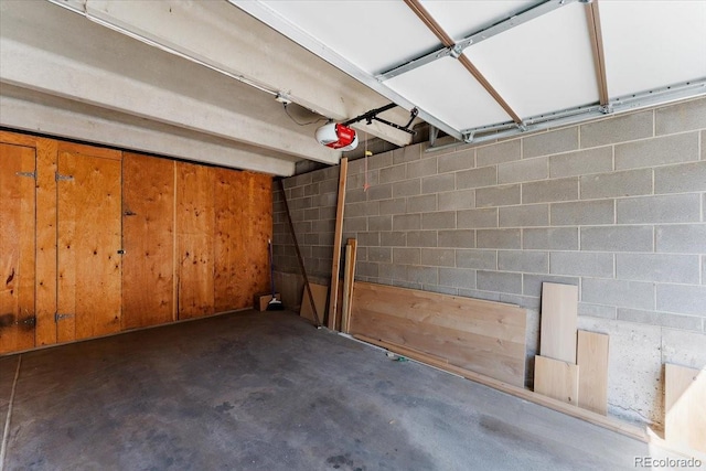 2979 Mesa Rd Unit D, Colorado Springs, CO 80904 - garage featuring concrete block wall and a garage door opener