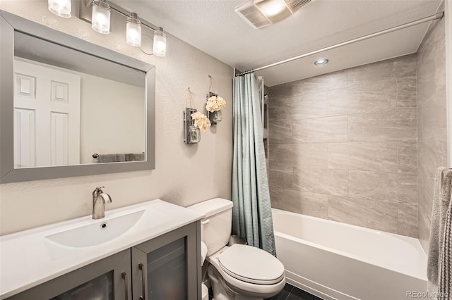 full bath with visible vents, shower / bathtub combination with curtain, toilet, a textured ceiling, and vanity