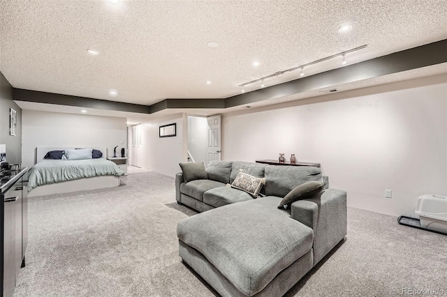 bedroom with carpet, recessed lighting, a textured ceiling, and visible vents