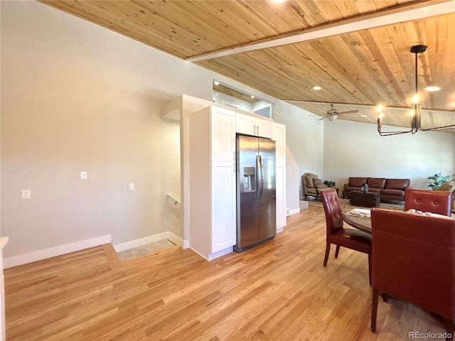 dining area featuring ceiling fan with notable chandelier, light hardwood / wood-style floors, and wooden ceiling