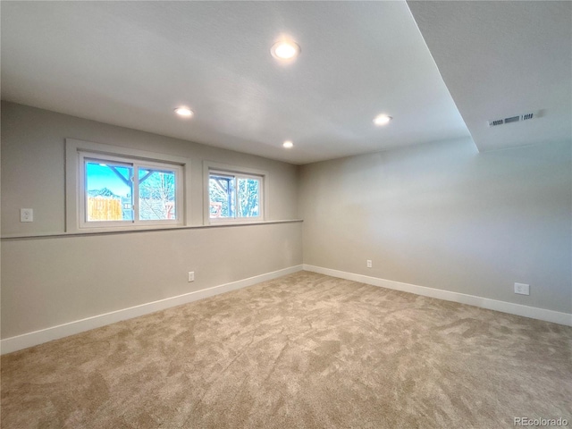 unfurnished room featuring carpet flooring