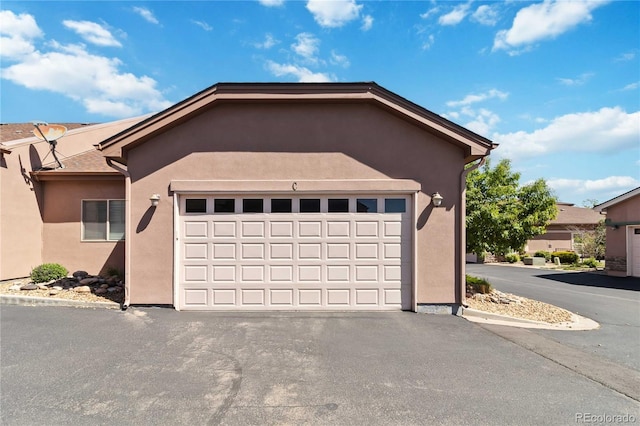 15501 E 112th Ave Unit 20C, Commerce City, CO 80022 - garage with driveway