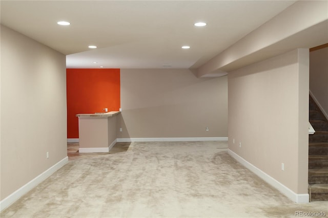 15501 E 112th Ave Unit 20C, Commerce City, CO 80022 - finished below grade area featuring recessed lighting, stairs, light colored carpet, and baseboards