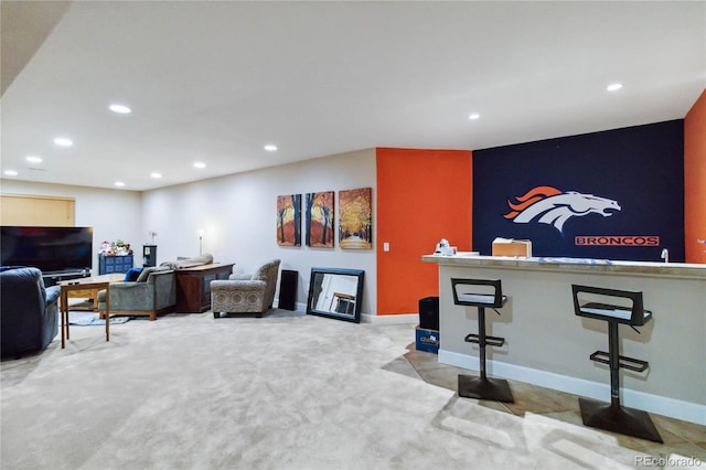 15501 E 112th Ave Unit 20C, Commerce City, CO 80022 - carpeted living room with recessed lighting and baseboards
