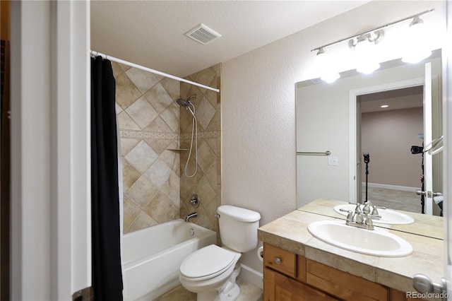 15501 E 112th Ave Unit 20C, Commerce City, CO 80022 - full bath featuring vanity, shower / tub combo, toilet, a textured wall, and baseboards