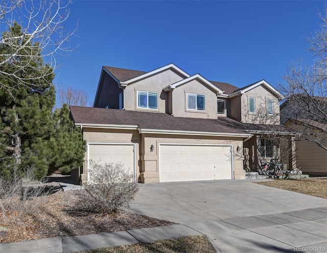 view of front of home with a garage