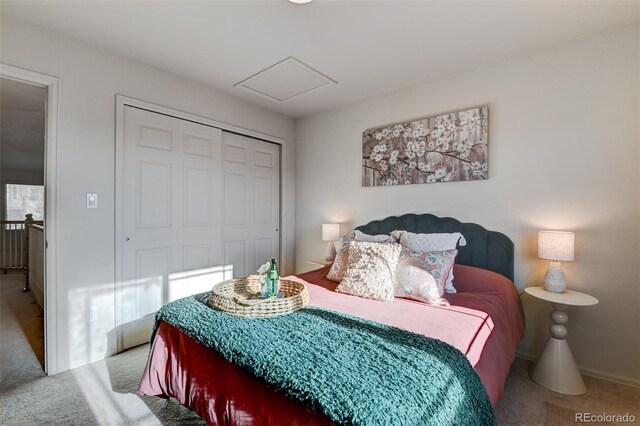 carpeted bedroom featuring a closet