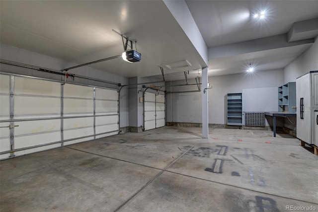 garage featuring a garage door opener