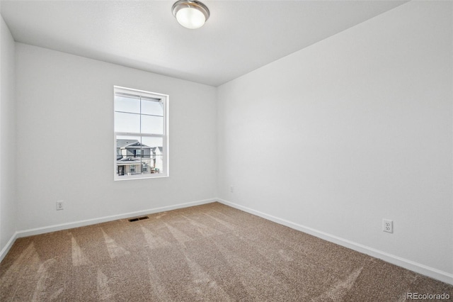 view of carpeted spare room