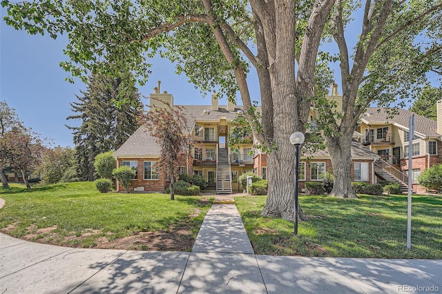 13704 E Lehigh Ave Unit D, Aurora, CO 80014 - view of property with stairs