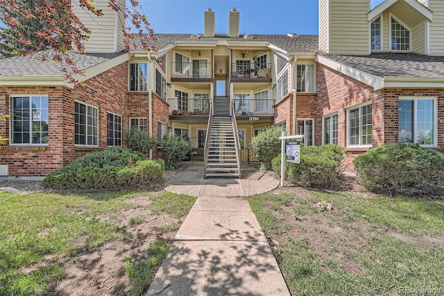 13704 E Lehigh Ave Unit D, Aurora, CO 80014 - view of property with stairs