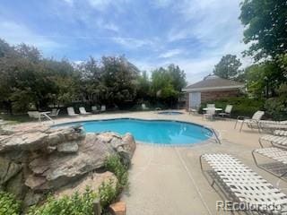 13704 E Lehigh Ave Unit D, Aurora, CO 80014 - community pool featuring a patio