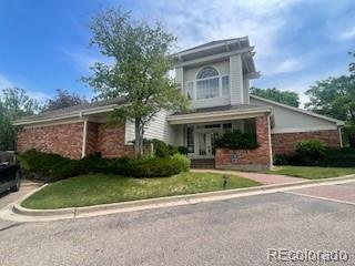 13704 E Lehigh Ave Unit D, Aurora, CO 80014 - view of front of property featuring brick siding