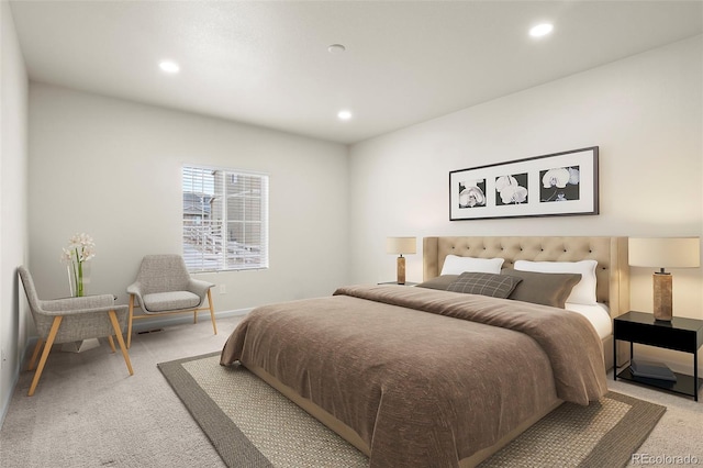 bedroom featuring recessed lighting and light carpet