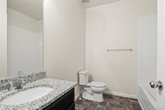 bathroom with visible vents, vanity, toilet, and baseboards