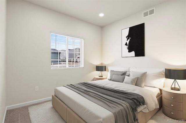 bedroom with recessed lighting, baseboards, visible vents, and light colored carpet