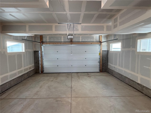 garage featuring a garage door opener