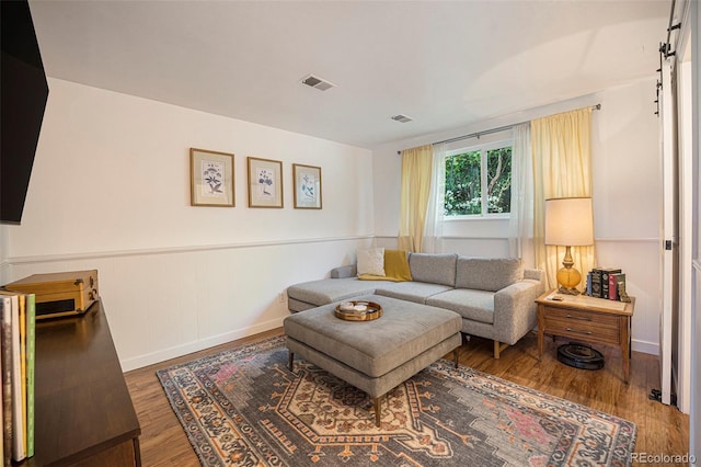 6248 W 75th, Arvada, CO 80003 - living area featuring wood finished floors and wainscoting