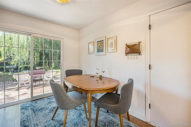 6248 W 75th, Arvada, CO 80003 - dining area featuring wood finished floors and baseboards