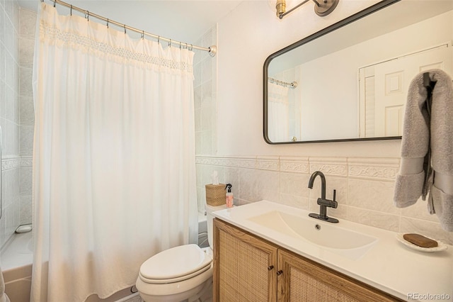 6248 W 75th, Arvada, CO 80003 - bathroom featuring shower / tub combo with curtain, vanity, and tile walls