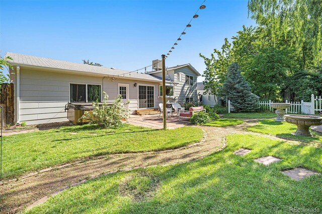 6248 W 75th, Arvada, CO 80003 - rear view of property featuring a patio and entry steps