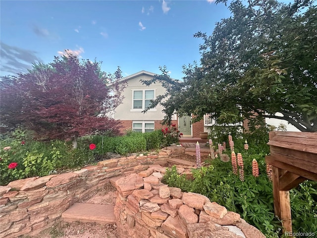 6248 W 75th, Arvada, CO 80003 - view of front of house featuring brick siding and stucco siding