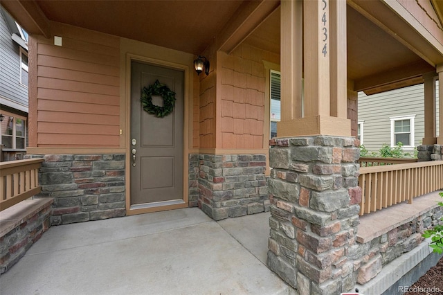 5434 N Xenia St, Denver, CO 80238 - entrance to property with stone siding and covered porch