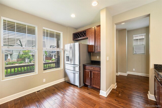 5434 N Xenia St, Denver, CO 80238 - kitchen featuring stainless steel fridge with ice dispenser, dark wood-type flooring, and recessed lighting
