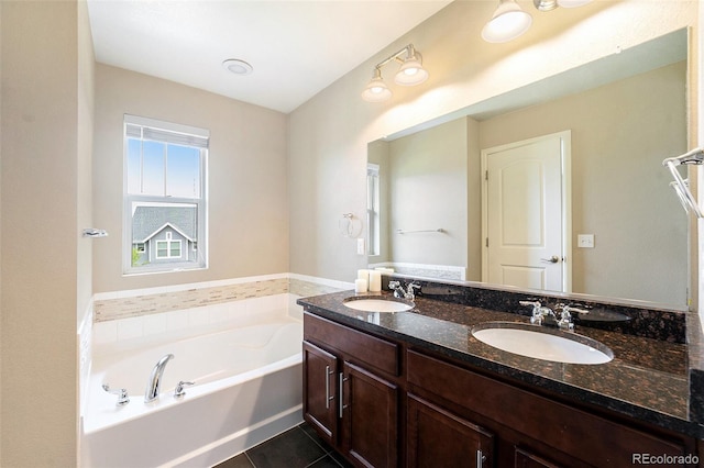 5434 N Xenia St, Denver, CO 80238 - full bath featuring double vanity, a bath, and tile patterned floors
