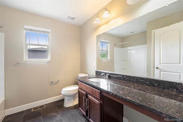 5434 N Xenia St, Denver, CO 80238 - bathroom with vanity and tile patterned floors