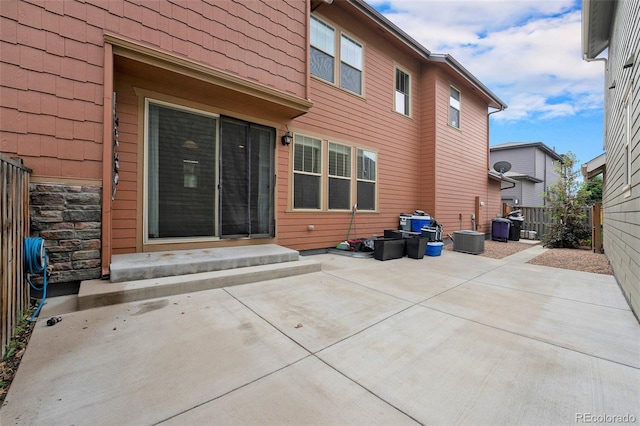 5434 N Xenia St, Denver, CO 80238 - rear view of property featuring a patio area and a fenced backyard