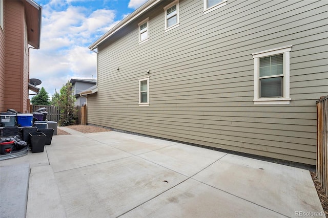 5434 N Xenia St, Denver, CO 80238 - view of home's exterior featuring a patio